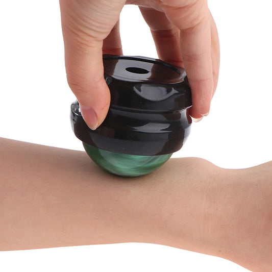 Masseur manuel roller ball.   ///   Manual roller ball massager